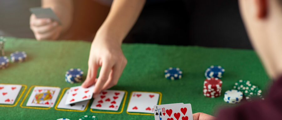 friends-having-fun-while-playing-poker